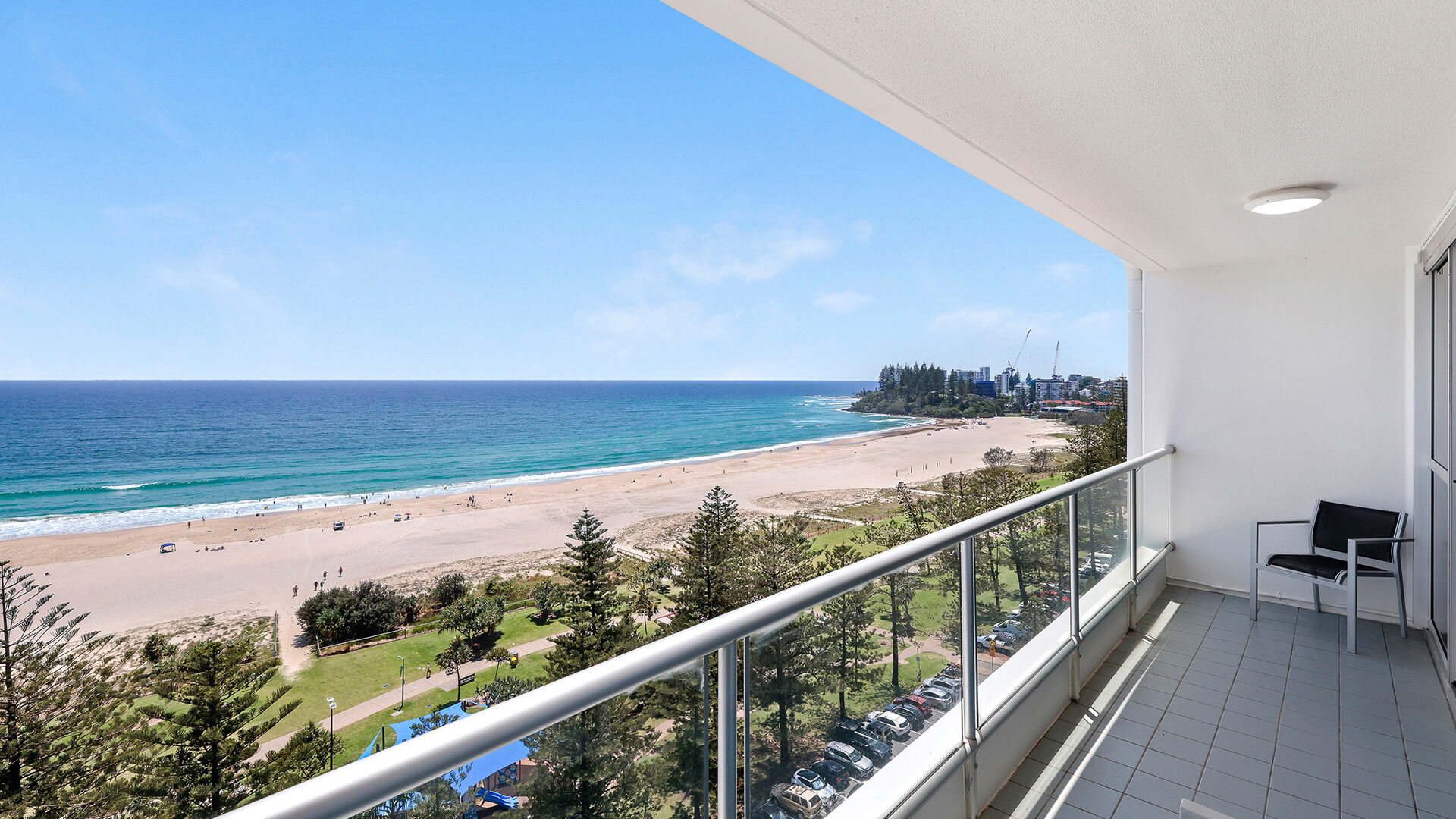 Beachfront balcony in the Deluxe 2 Bedroom Centre Front Apartment at ULTIQA Points North overlooking Coolangatta Beach.