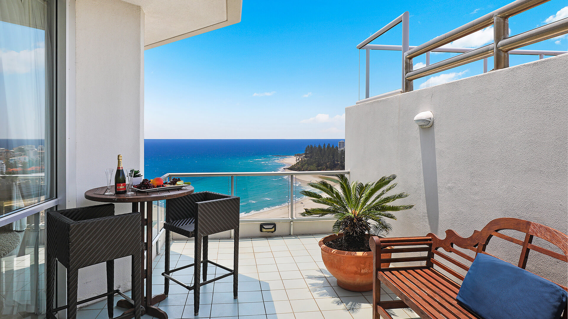 Private terrace of the 4 Bedroom Oceanfront Penthouse at ULTIQA Points North with seating and ocean views.