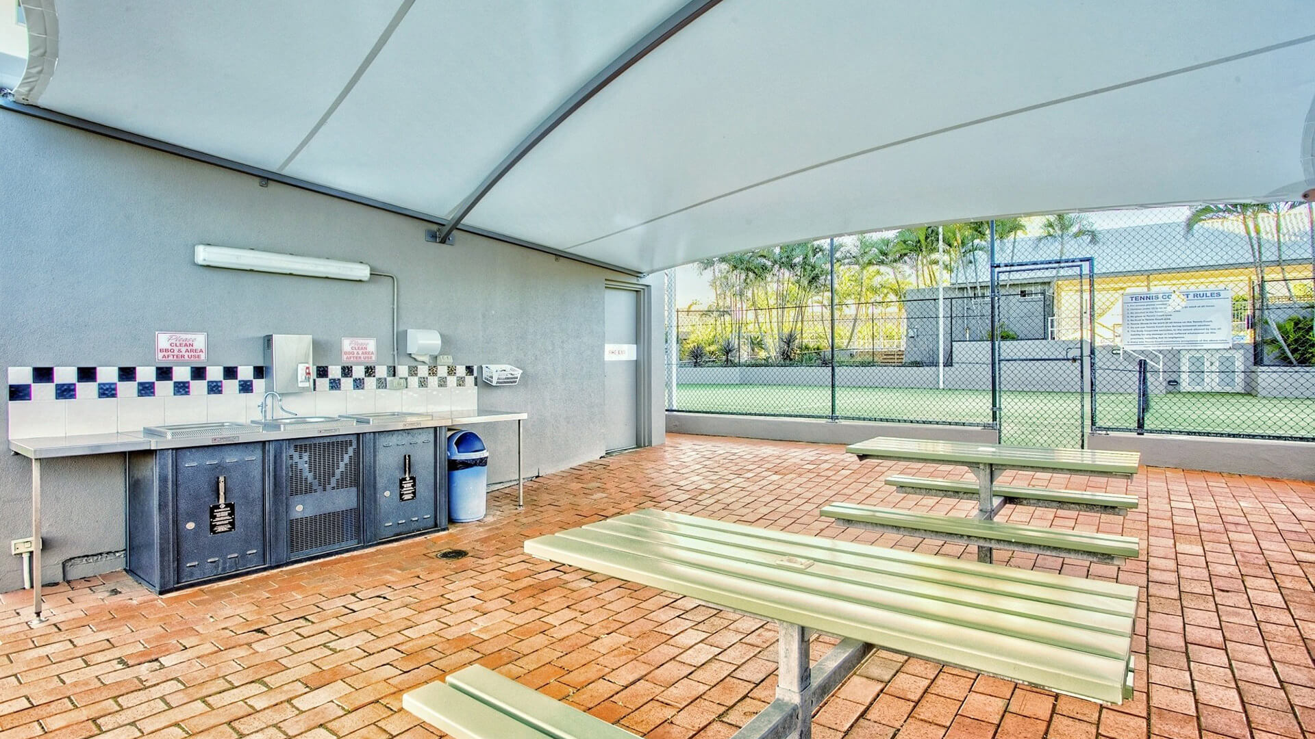 ULTIQA Points North. BBQ Area with Seating and Cleaning Facilities.