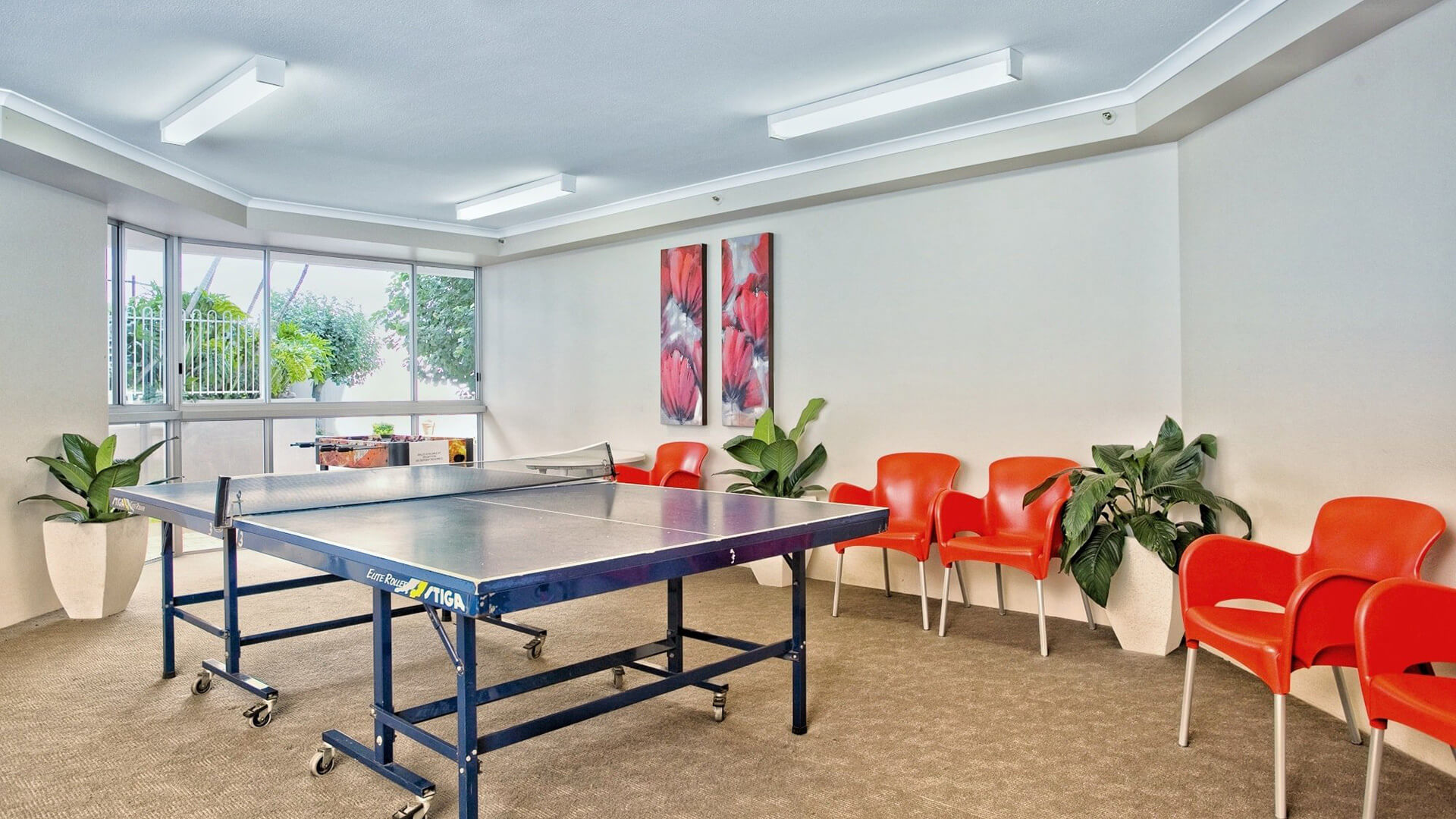 ULTIQA Points North. Table Tennis with Seating Area.
