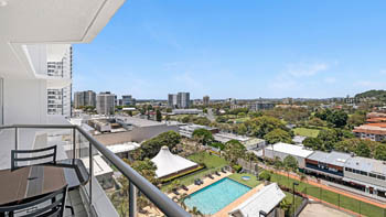 Balcony in the 2 Bedroom Pool View Apartment at ULTIQA Points North overlooking the resort pool and Coolangatta skyline.