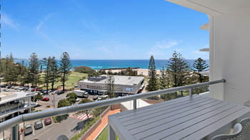 Balcony view from the Standard 2 Bedroom Centre Front Apartment at ULTIQA Points North, overlooking Coolangatta Beach and the surf club.