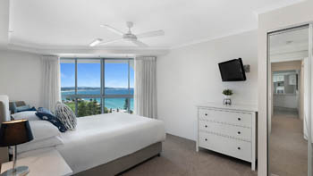 Main bedroom with ocean views in the Superior 1 Bedroom Ocean View Apartment at ULTIQA Points North.