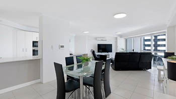 Dining, kitchen and living area in the Superior 1 Bedroom Ocean View Apartment at ULTIQA Points North.