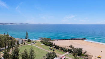 Beachfront balcony overlooking Coolangatta Beach in the Superior 1 Bedroom Ocean View Apartment at ULTIQA Points North.