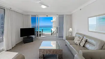 Living area with ocean views in the Standard 2 Bedroom Ocean View Apartment at ULTIQA Beach Haven on Broadbeach.
