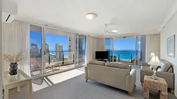 Spacious lounge area with sweeping ocean views in the Standard 2 Bedroom Ocean View Apartment at ULTIQA Beach Haven on Broadbeach.