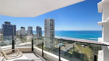 Balcony seating with stunning views of the ocean and Gold Coast skyline from the Standard 2 Bedroom Ocean View Apartment at ULTIQA Beach Haven on Broadbeach.