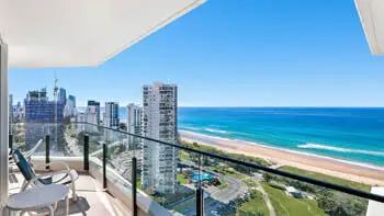 Ocean-view balcony seating overlooking Surfers Paradise beach at ULTIQA Beach Haven on Broadbeach, Gold Coast.