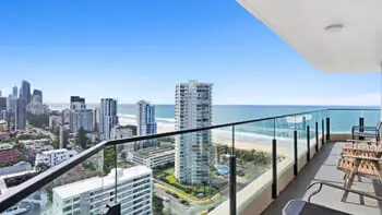 View of the Gold Coast shoreline and ocean in the background from the balcony at ULTIQA Beach Haven on Broadbeach.