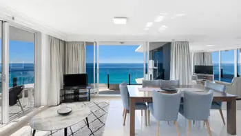 Dining and lounge area with stunning ocean views in the Sub Penthouse at ULTIQA Beach Haven on Broadbeach.