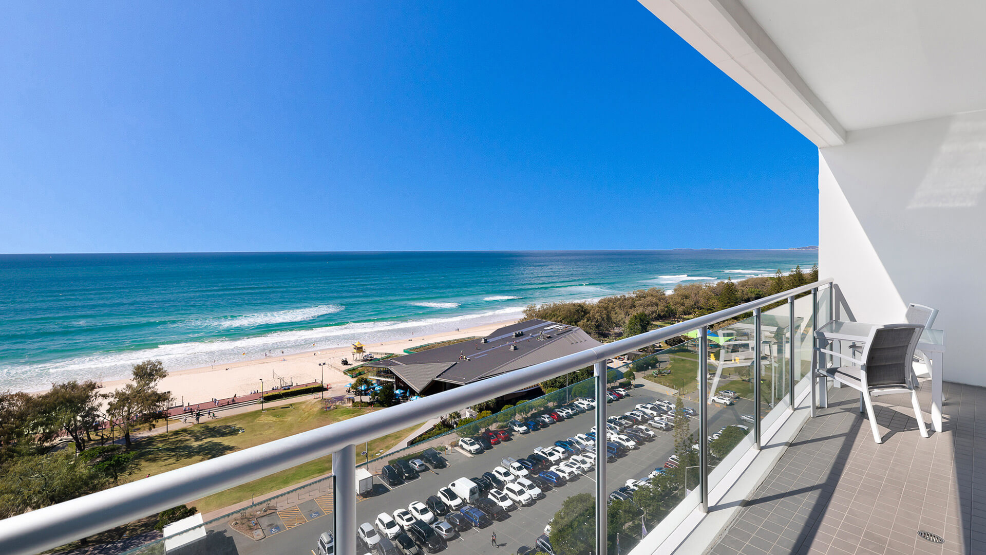 Private balcony with seating and ocean views in 1 Bedroom Ocean View Apartment at ULTIQA Air on Broadbeach.