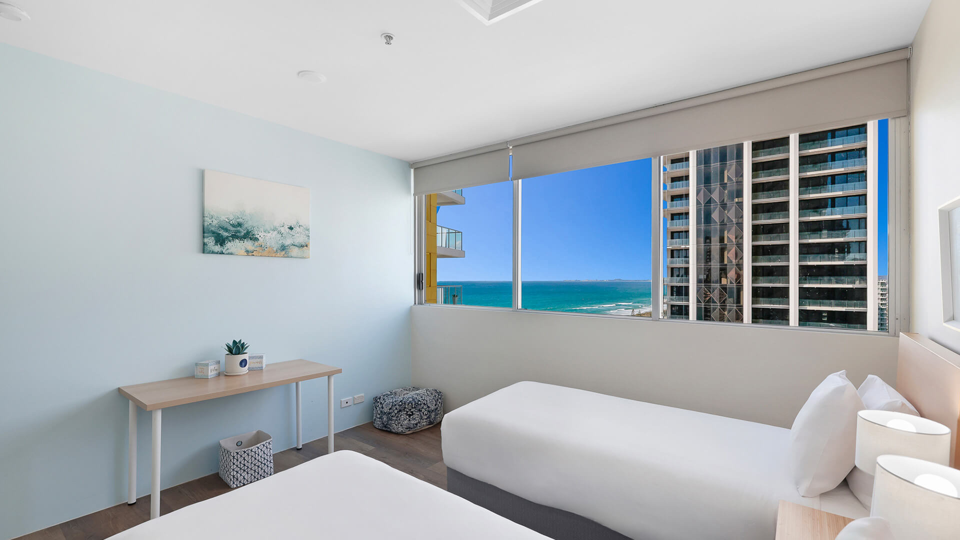 Twin bedroom with ocean views in 2 Bedroom Gold Coast View Suite at ULTIQA Air on Broadbeach.
