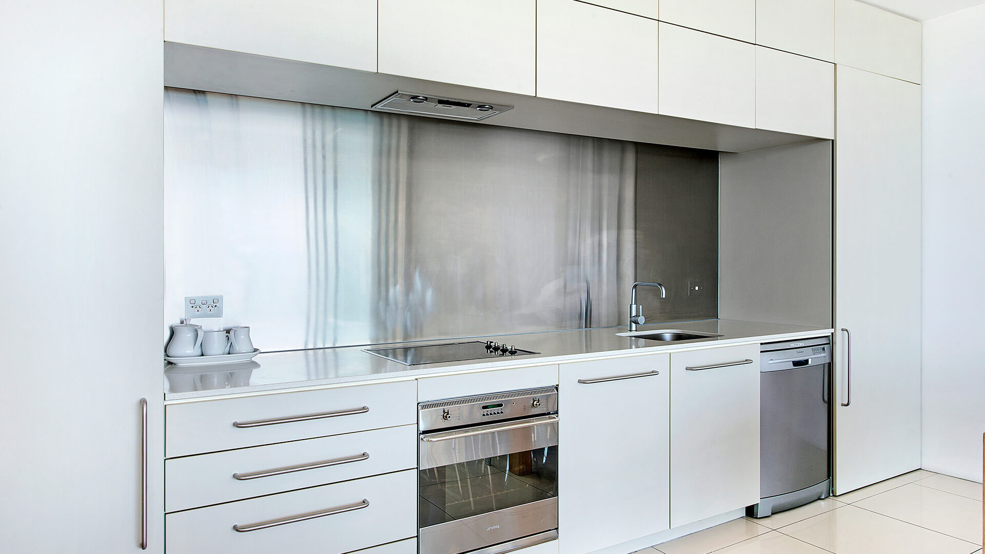 Modern full kitchen with stainless steel appliances in 2 Bedroom Ocean View Apartment at ULTIQA Air on Broadbeach.