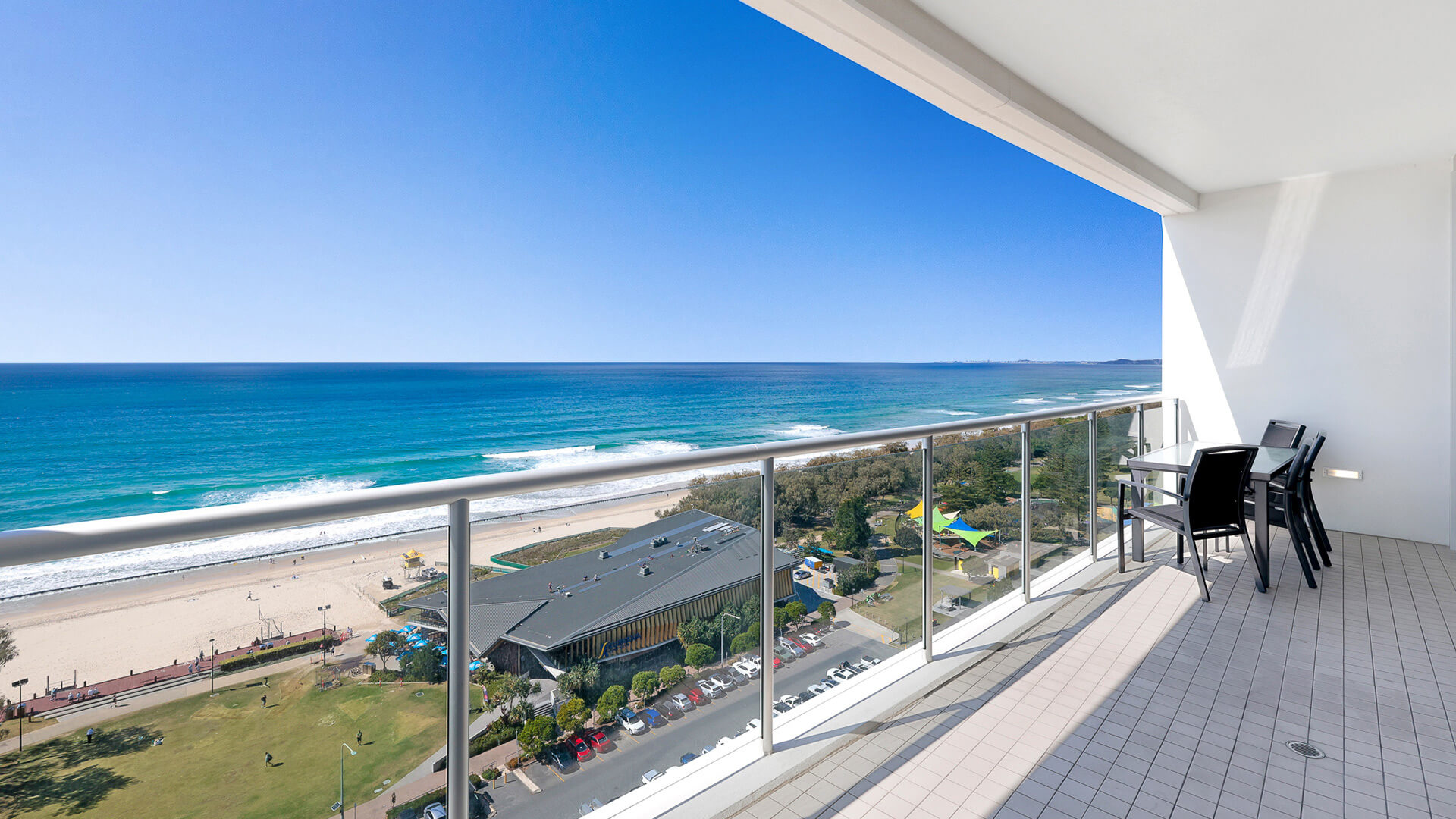 Spacious balcony with outdoor dining and panoramic ocean views at ULTIQA Air on Broadbeach.