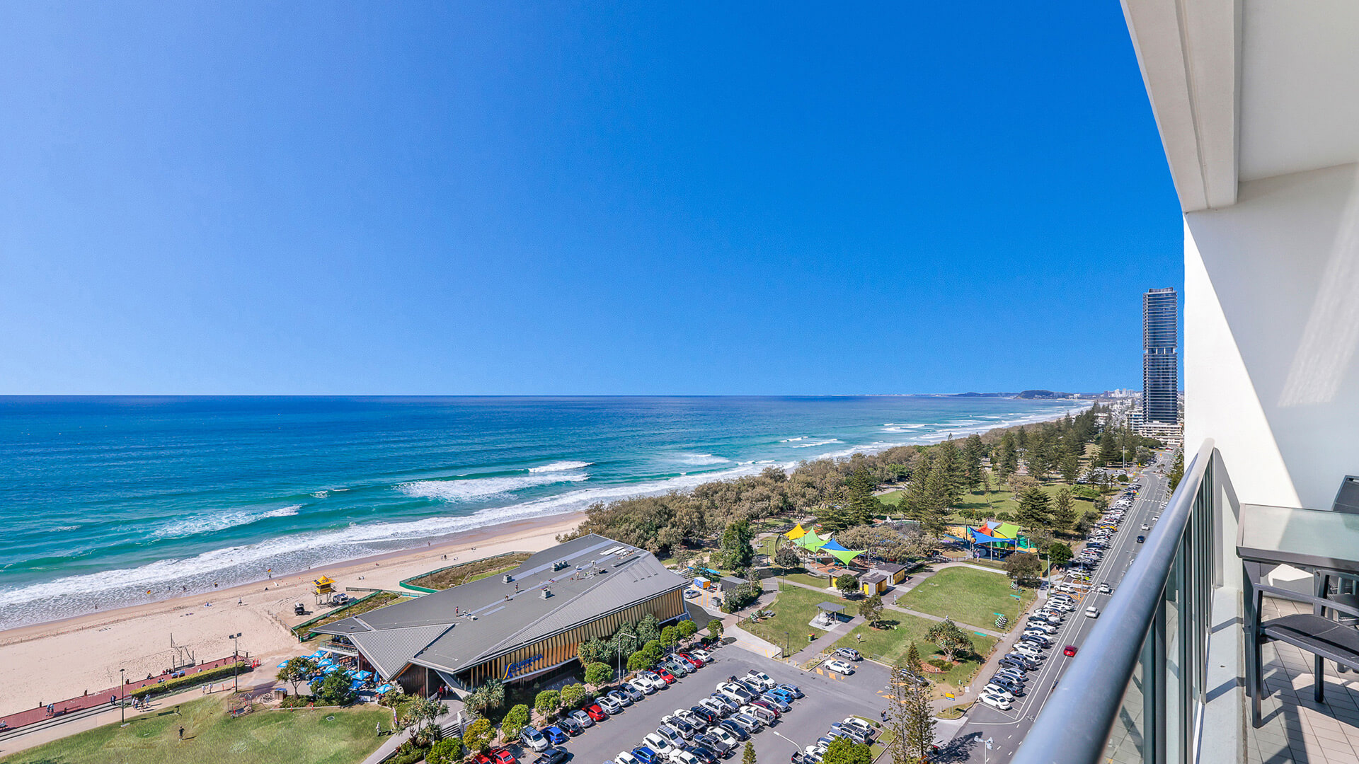 Private balcony with sweeping ocean and coastline views at ULTIQA Air on Broadbeach.