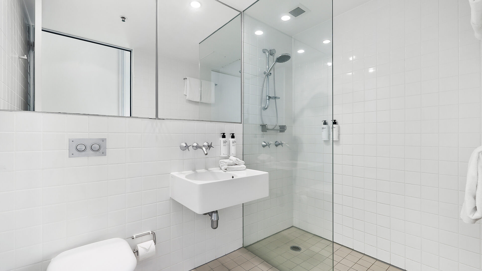 Bathroom with walk-in shower in the 2 Bedroom Ocean View Apartment at ULTIQA Air on Broadbeach.