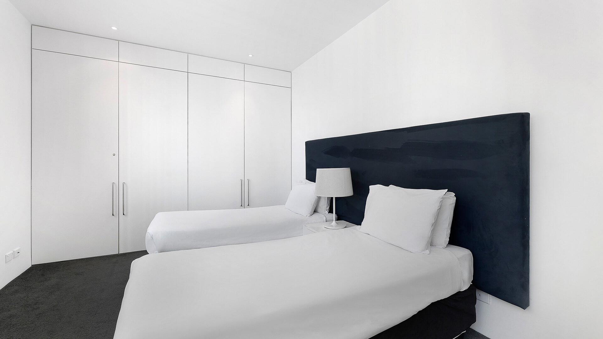 Second bedroom with twin beds in 2 Bedroom Ocean View Suite at ULTIQA Air on Broadbeach.