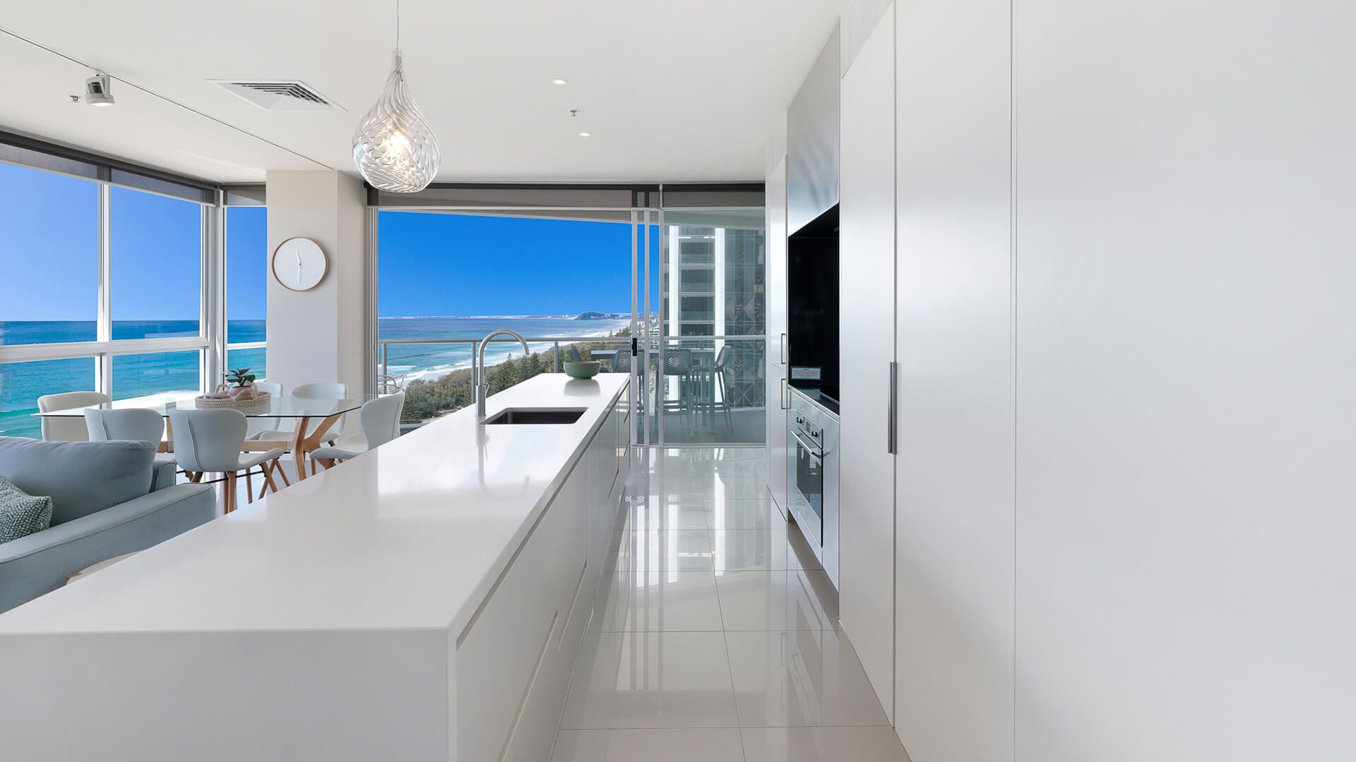 Open kitchen with ocean views and modern appliances in 2 Bedroom Ocean View Suite at ULTIQA Air on Broadbeach.