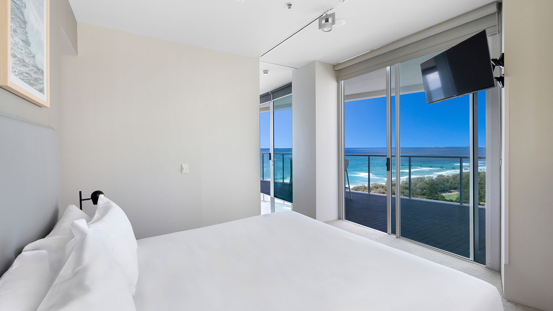 Ocean views from bedroom with balcony access in 2 Bedroom Ocean View Suite at ULTIQA Air on Broadbeach.