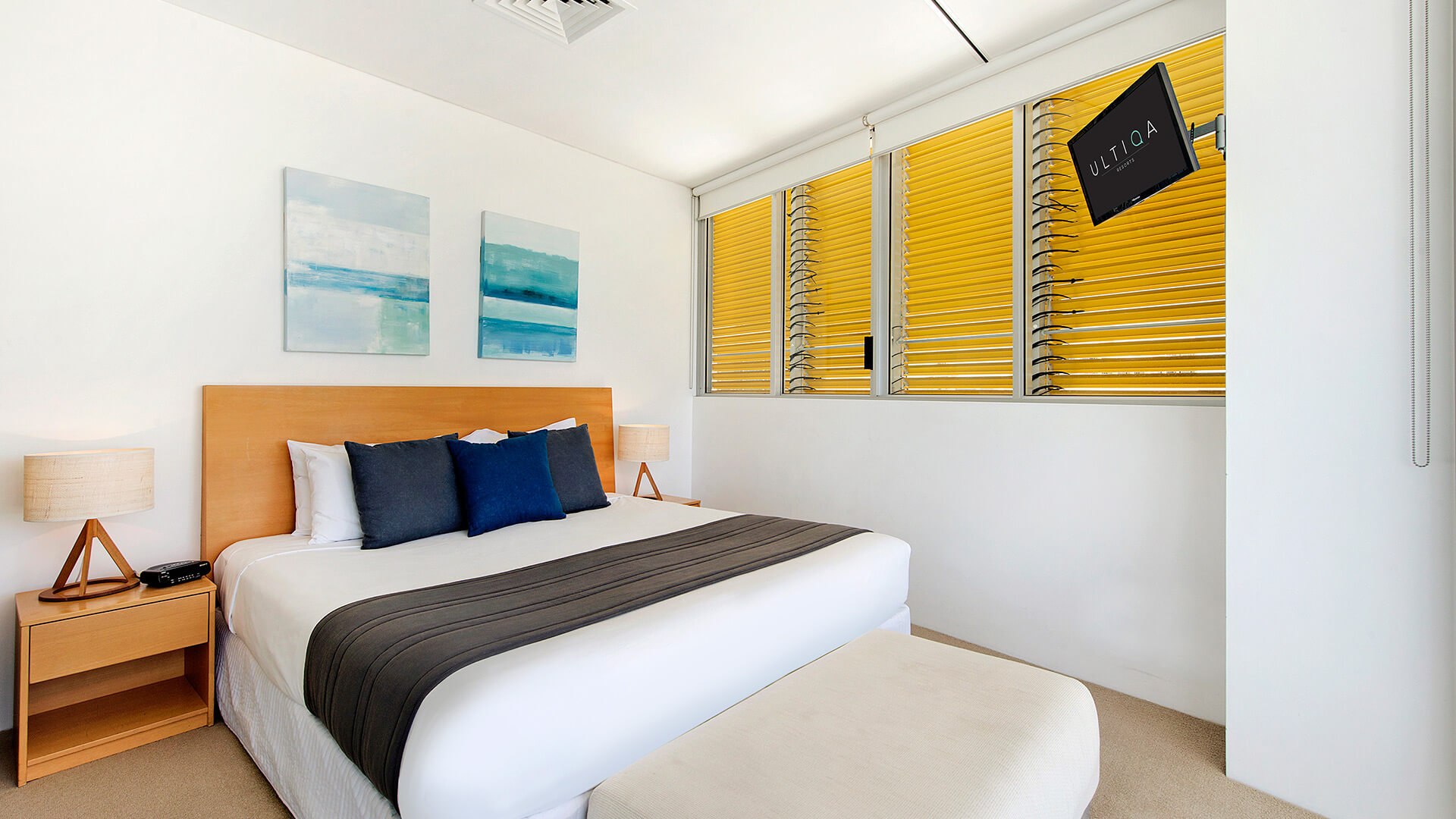 Master bedroom with king bed in 3 Bedroom Ocean View Apartment at ULTIQA Air on Broadbeach.
