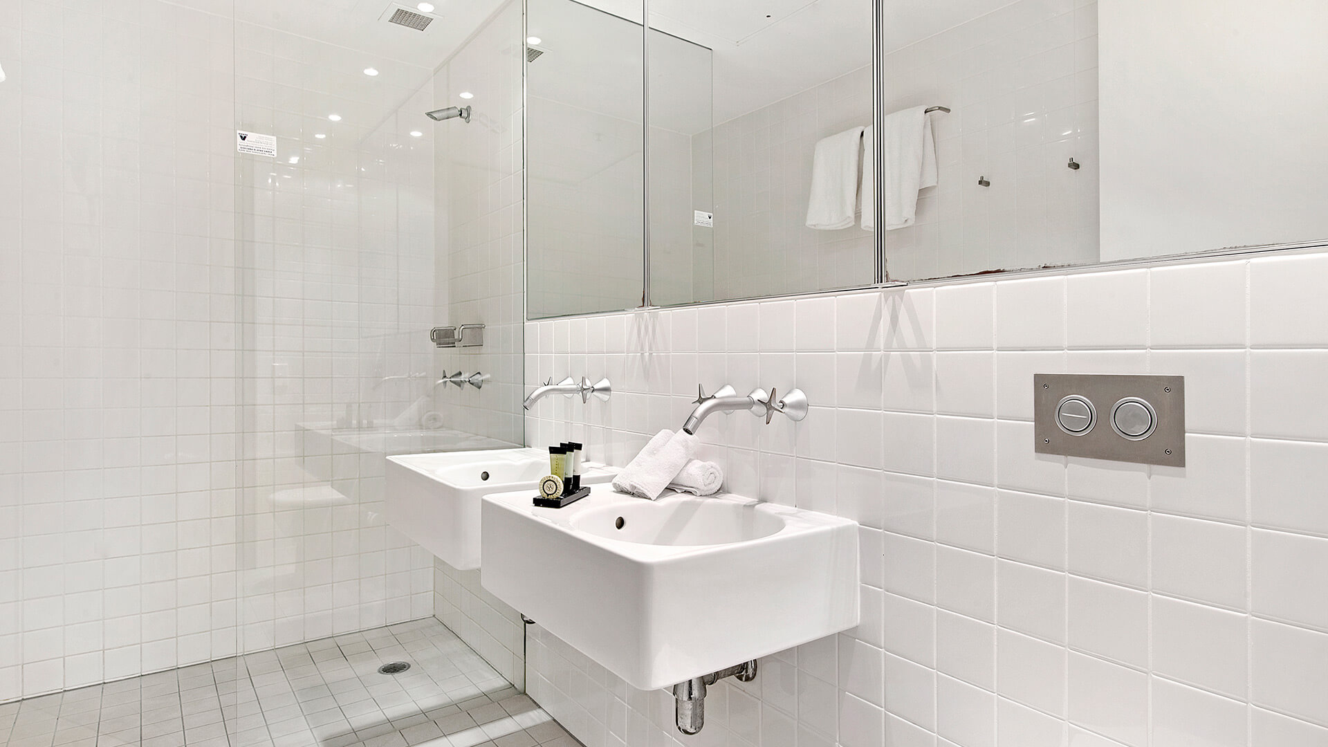 Modern ensuite bathroom with double vanity and walk-in shower in 3 Bedroom Apartment at ULTIQA Air on Broadbeach.