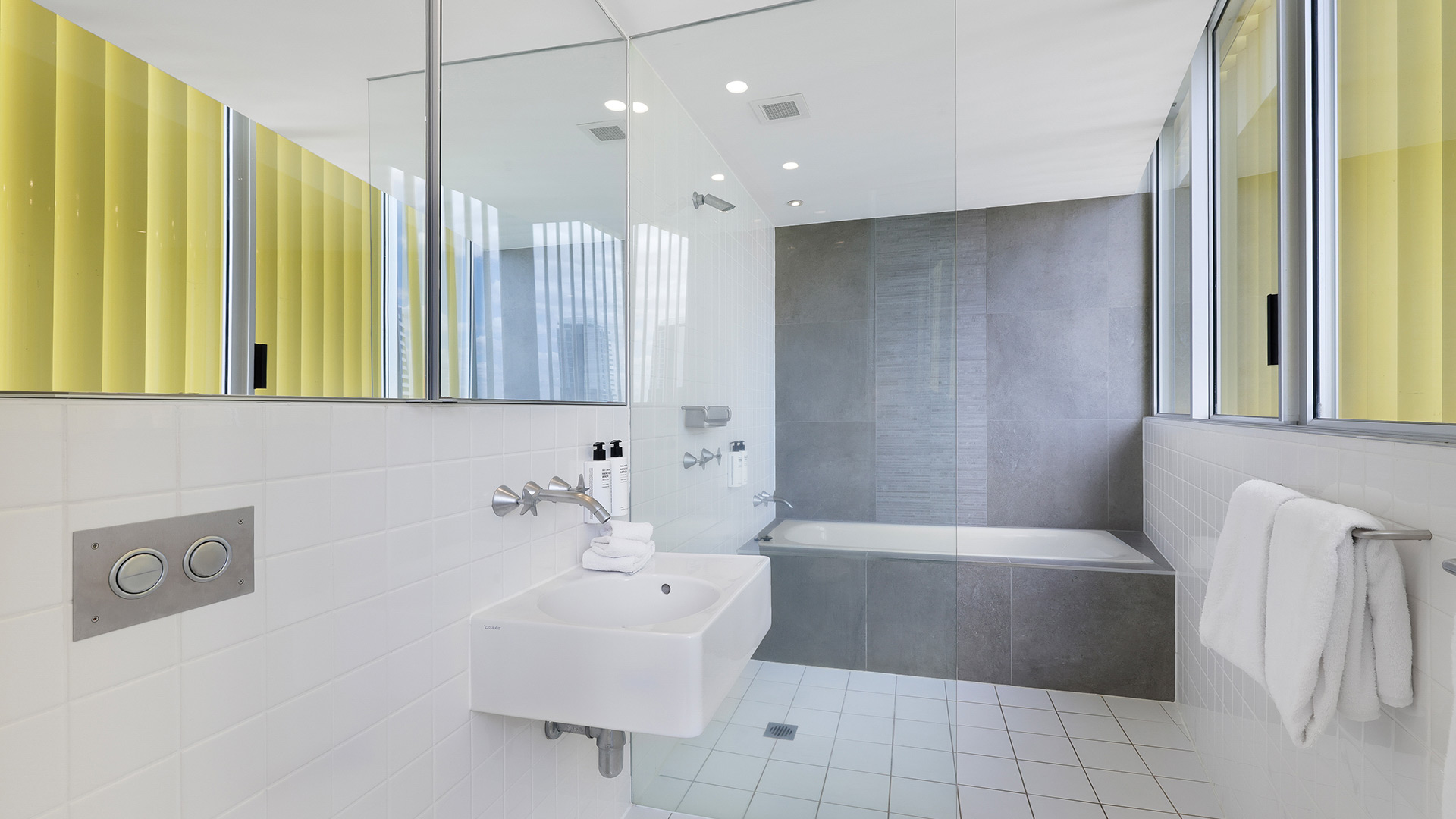 Modern bathroom with bathtub in 3 Bedroom Ocean View Apartment at ULTIQA Air on Broadbeach.