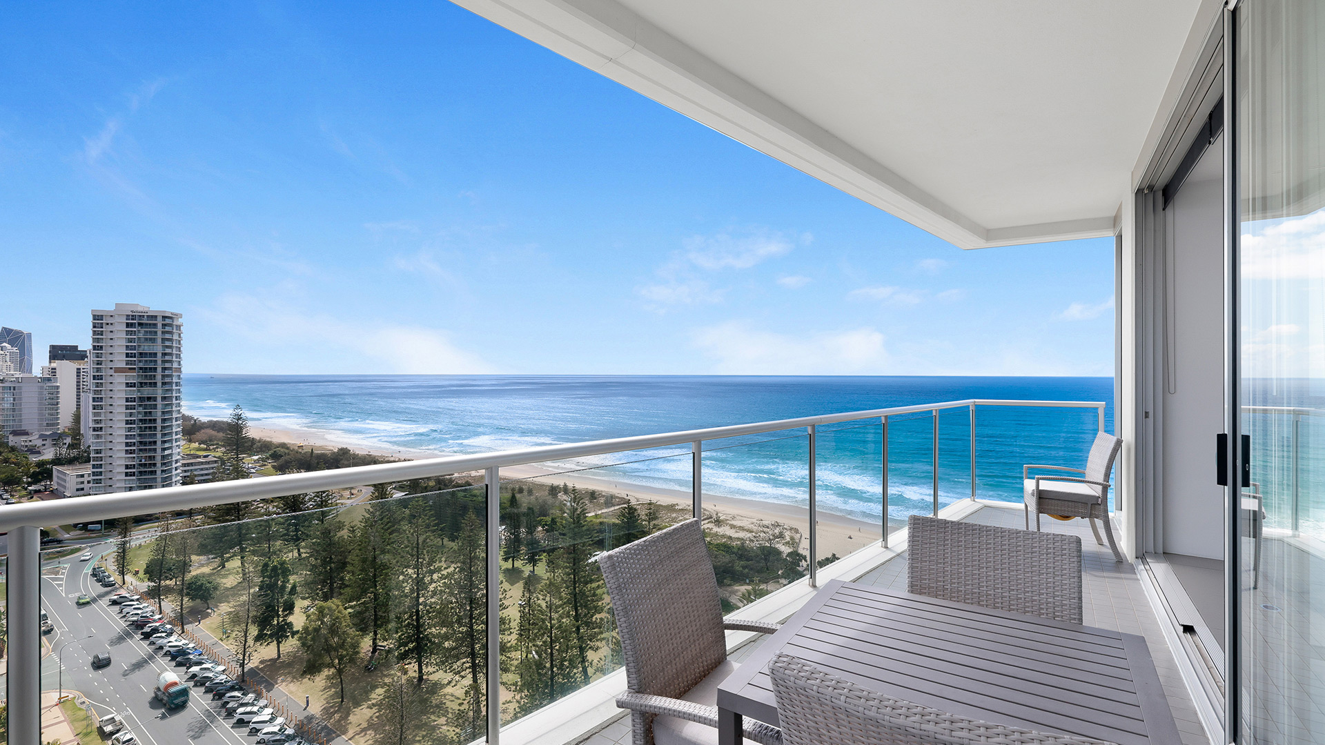Balcony dining area with stunning ocean views at ULTIQA Air on Broadbeach 3 Bedroom Apartment.