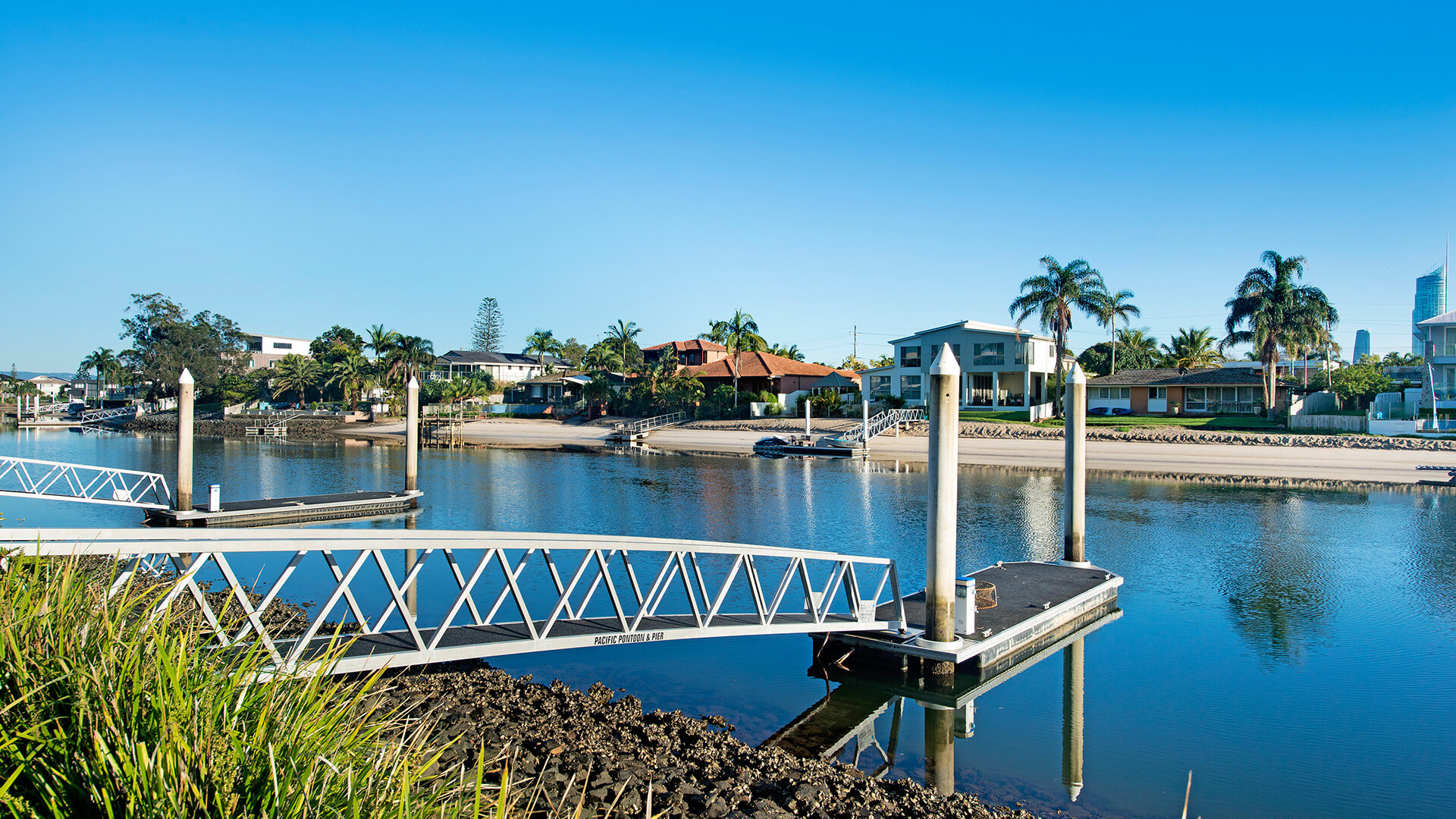 Fishing jetty and waterfront view of ULTIQA Freshwater Point Resort, Broadbeach.