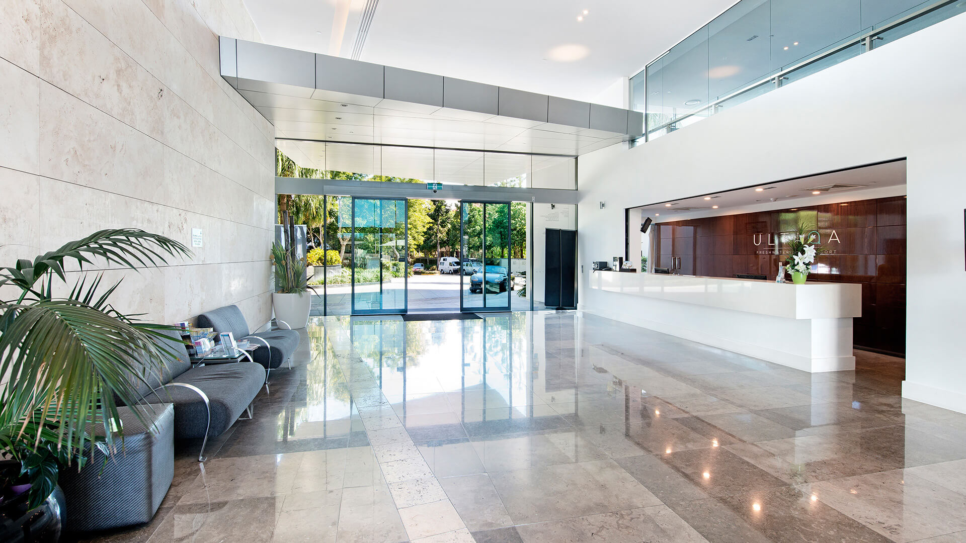 Spacious and modern reception area at ULTIQA Freshwater Point Resort, Broadbeach.