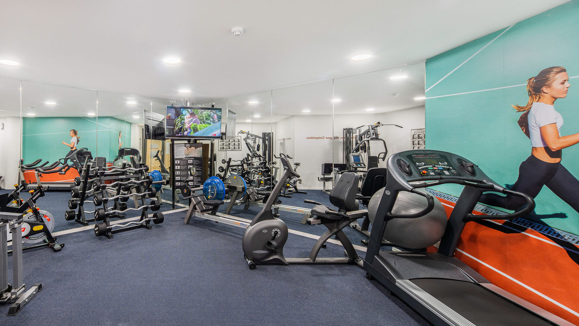 Fully equipped gym with cardio machines, free weights and strength training equipment at ULTIQA Shearwater Resort.