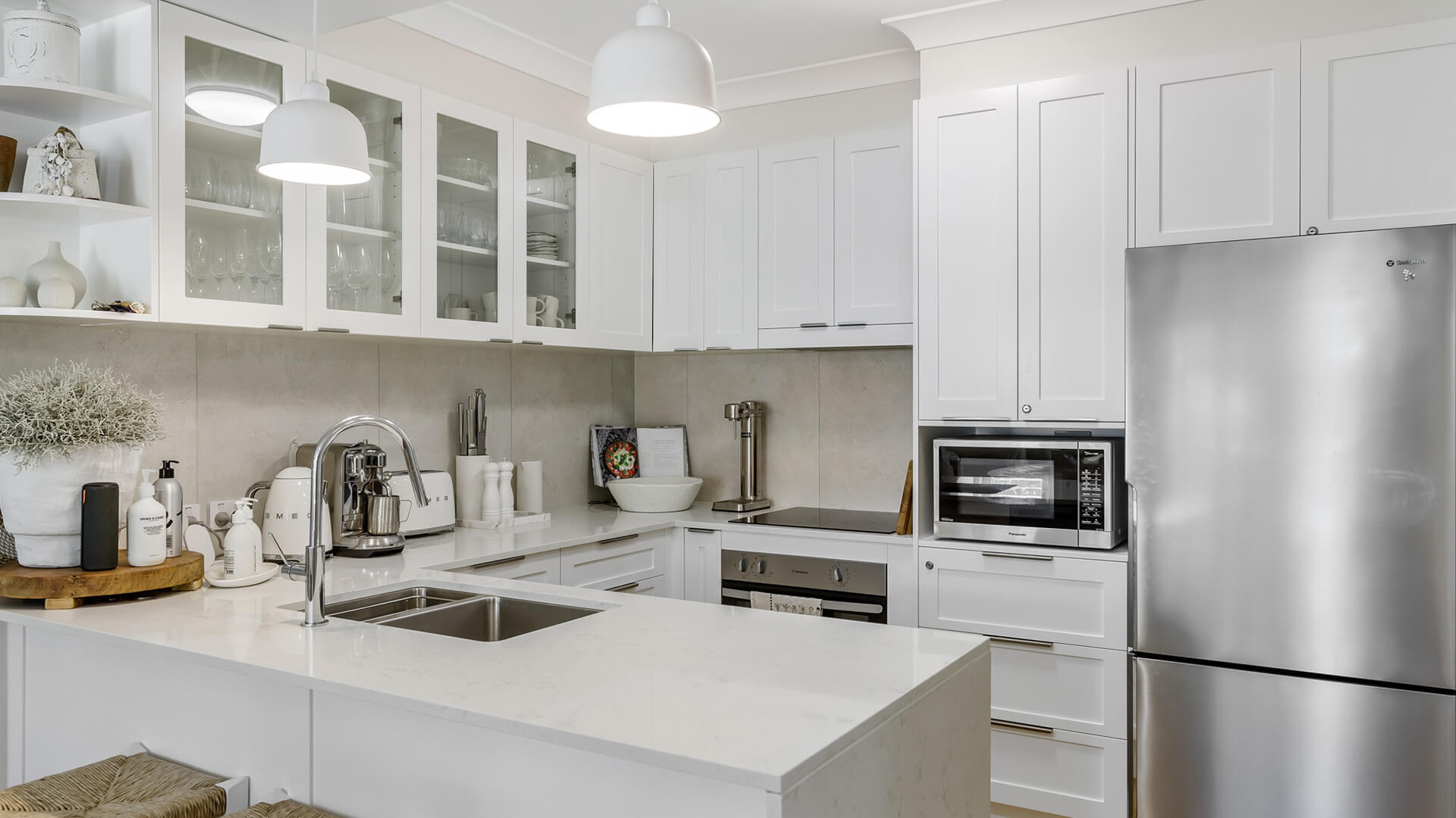 Fully equipped modern kitchen in 2 Bedroom Superior Apartment at ULTIQA Burleigh Mediterranean Resort.