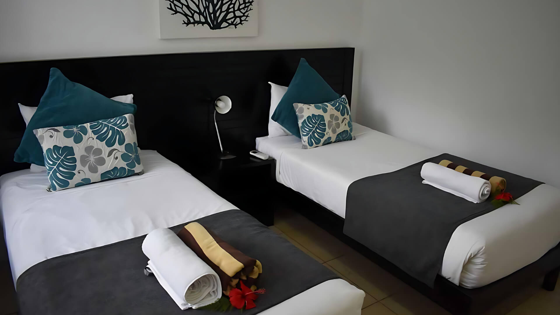 Twin bedroom in Standard 2 Bedroom 1 Bathroom Apartment at ULTIQA Fiji.