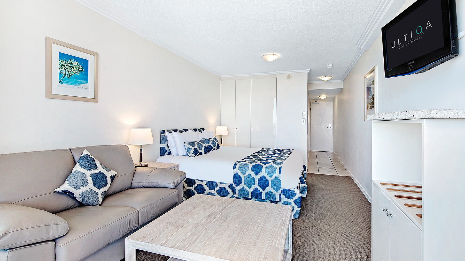 Open-plan Studio at ULTIQA Shearwater Resort with queen bed, sofa, and coffee table.