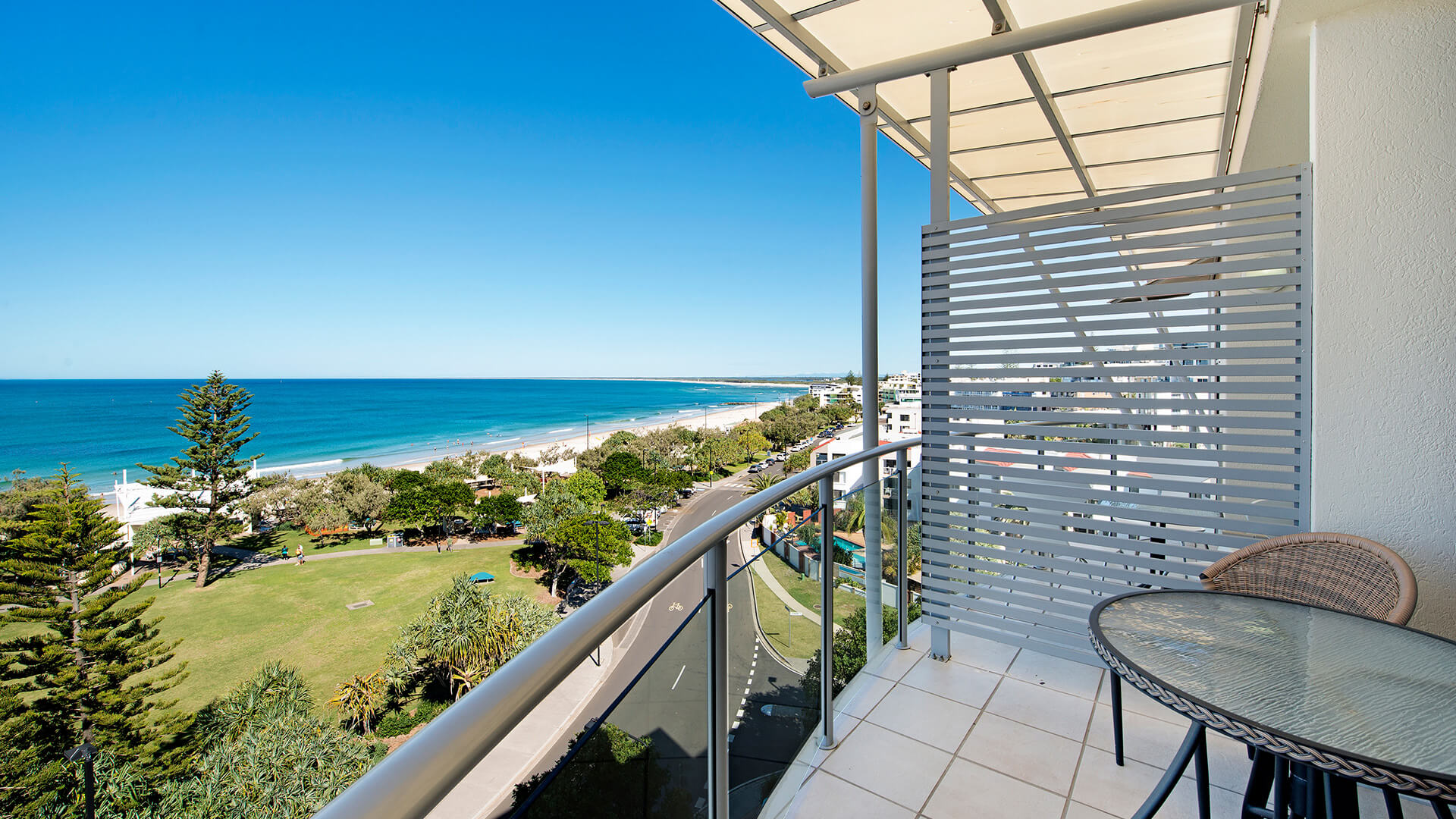 Private balcony with outdoor seating and stunning ocean views from Studio at ULTIQA Shearwater Resort.