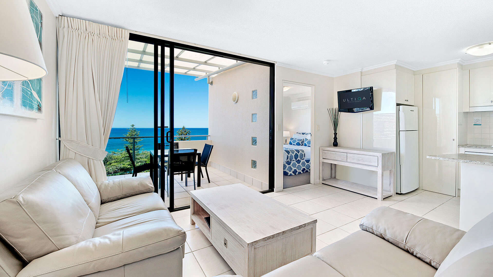 Living area with ocean views in 1 Bedroom Apartment at ULTIQA Shearwater Resort.