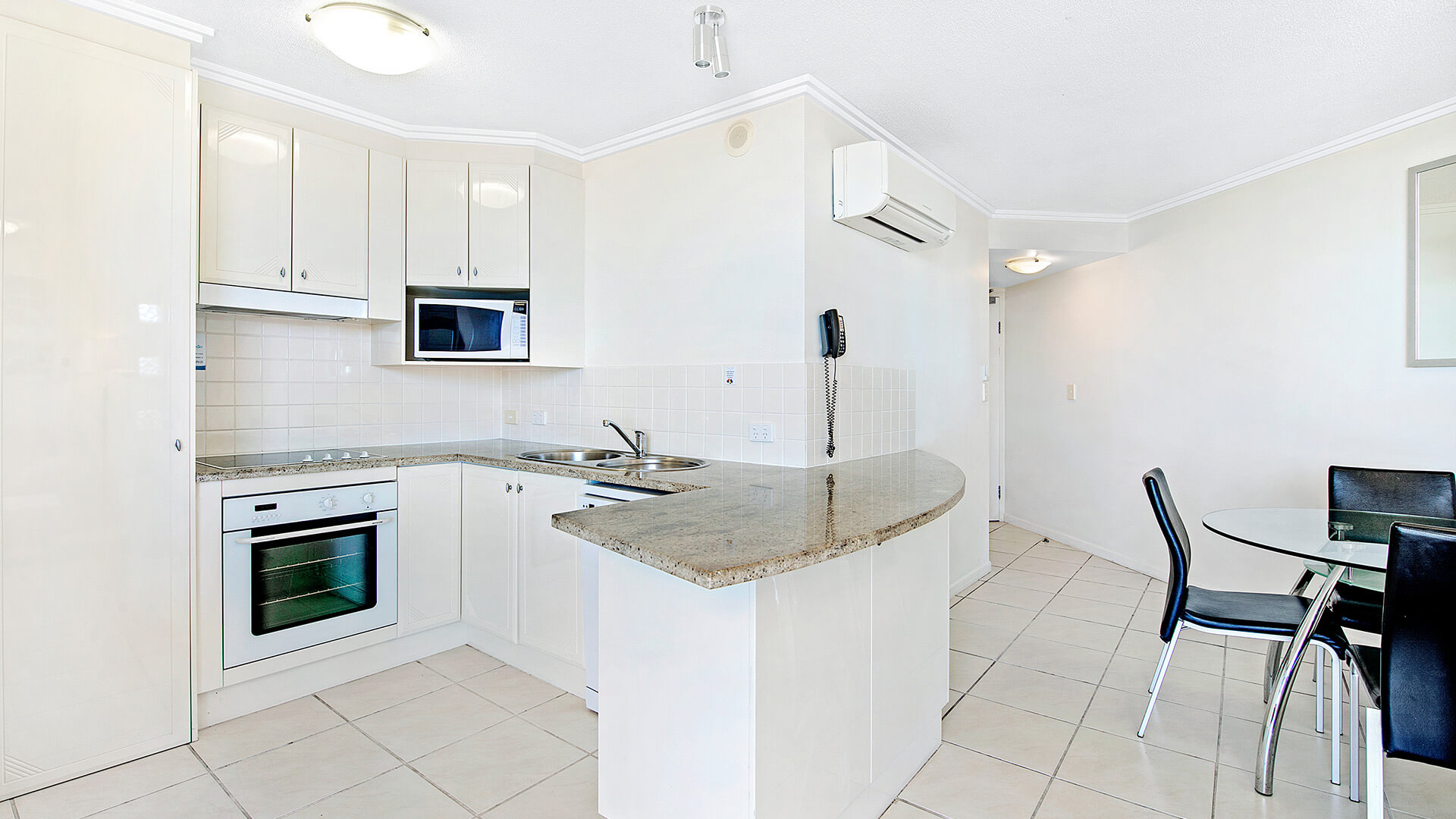 Fully equipped kitchen in 1 Bedroom Apartment at ULTIQA Shearwater Resort.