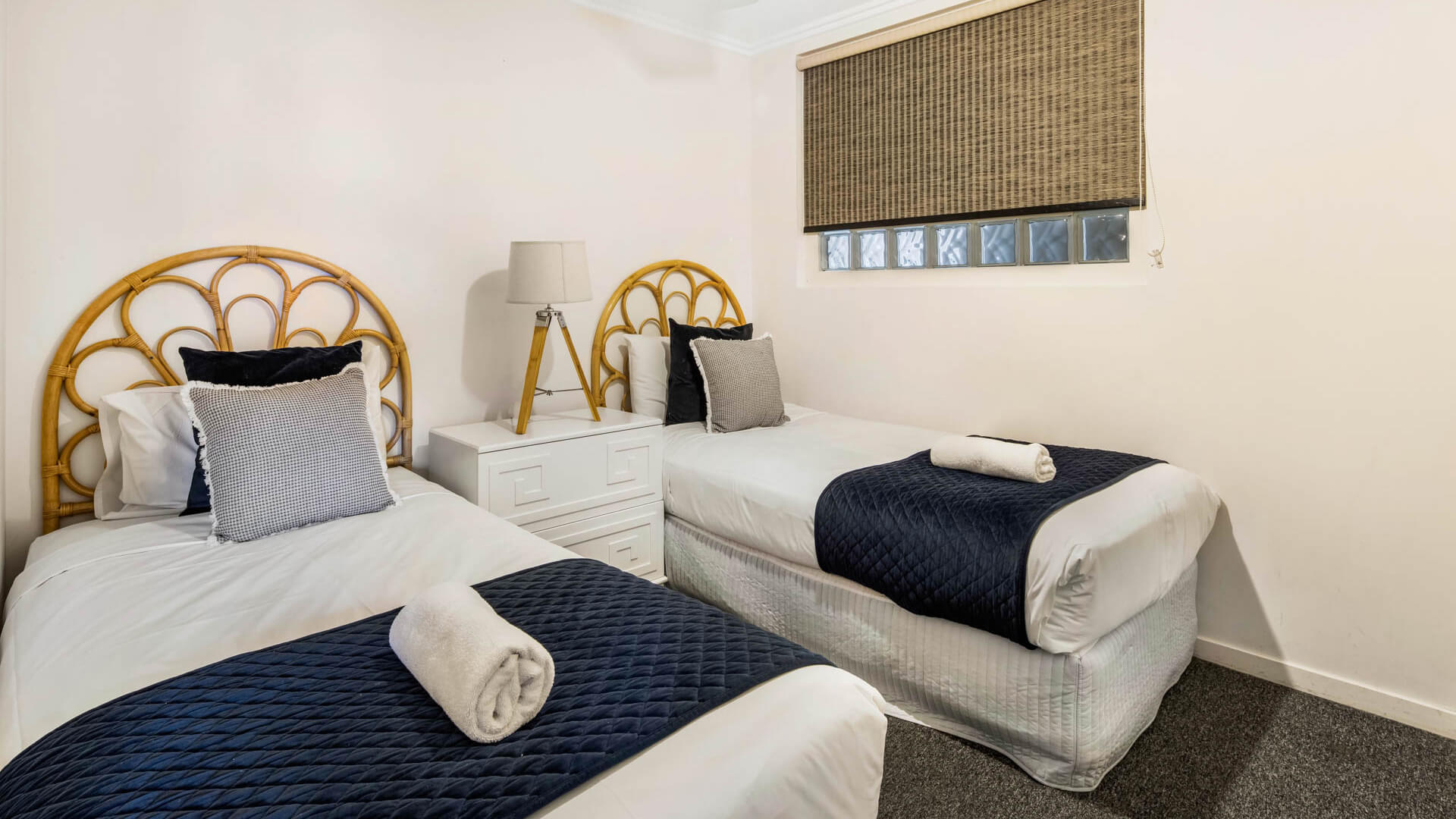 Twin bedroom with coastal décor in 3 Bedroom Penthouse at ULTIQA Shearwater Resort.