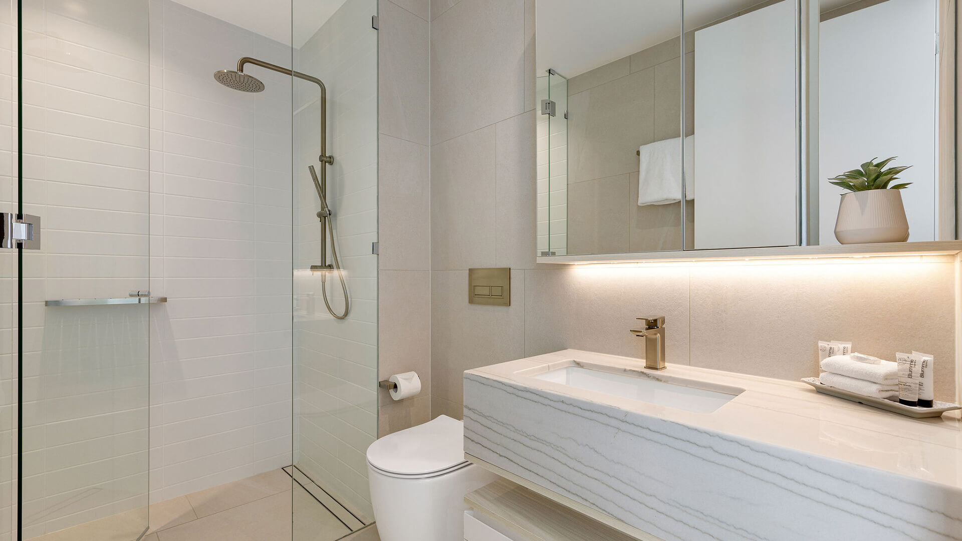 Bathroom in 3 Bedroom Ocean Sub-Penthouse at ULTIQA Signature at Broadbeach with walk-in shower.
