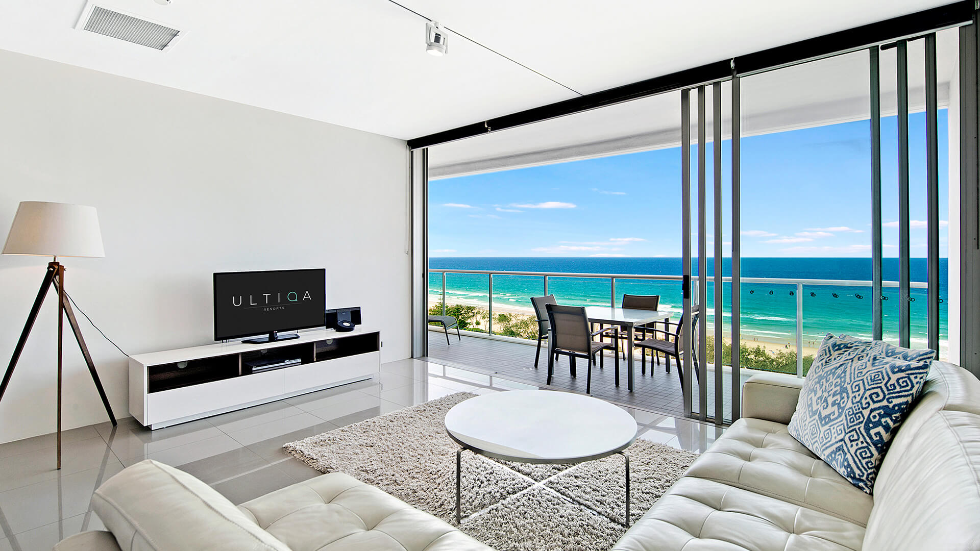 Spacious living area with balcony and ocean views in 1 Bedroom Ocean View Apartment at ULTIQA Air on Broadbeach.
