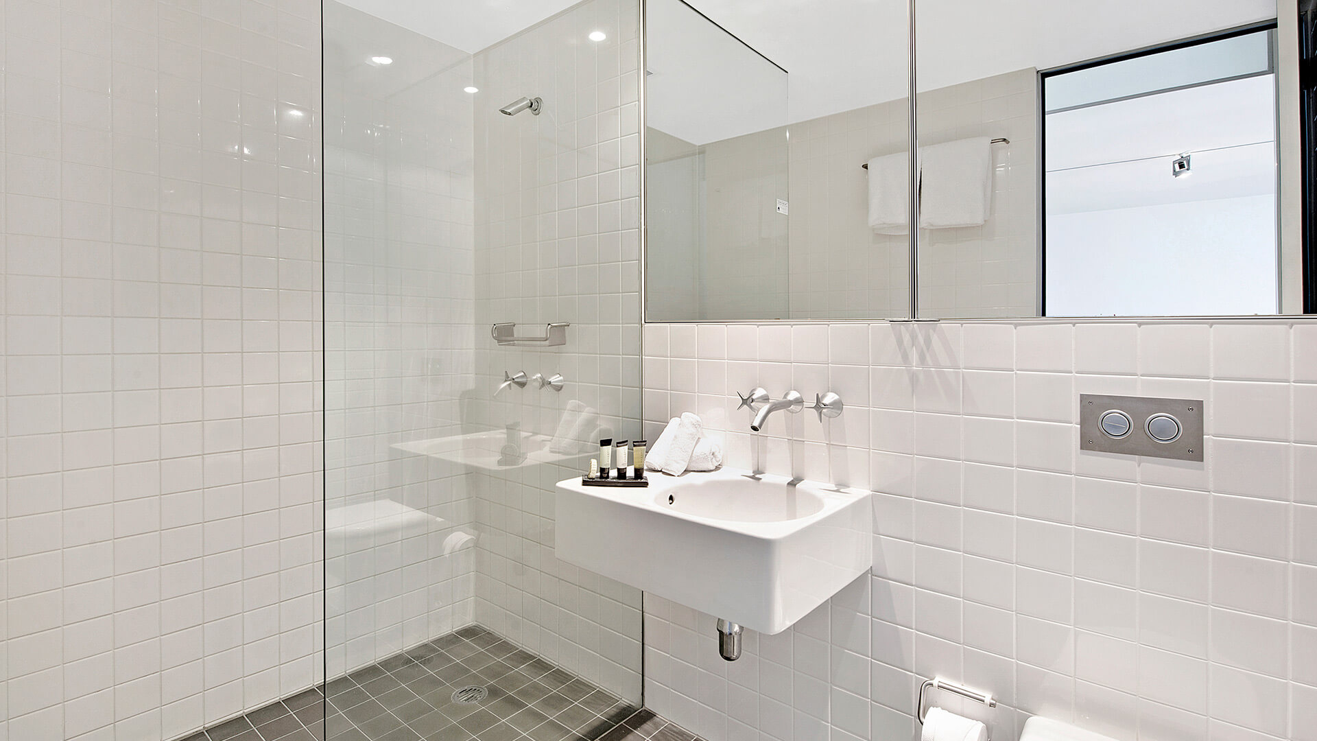 Bathroom with walk-in shower in 1 Bedroom Ocean View Apartment at ULTIQA Air on Broadbeach.