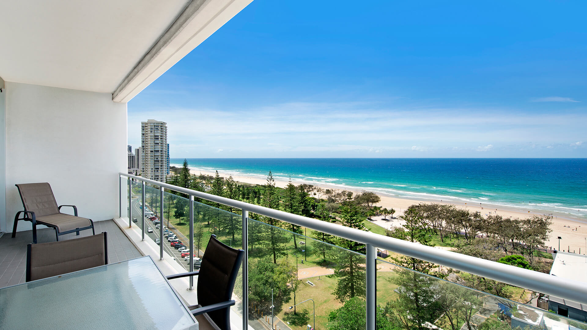 Private balcony with seating and ocean views in 1 Bedroom Ocean View Apartment at ULTIQA Air on Broadbeach.