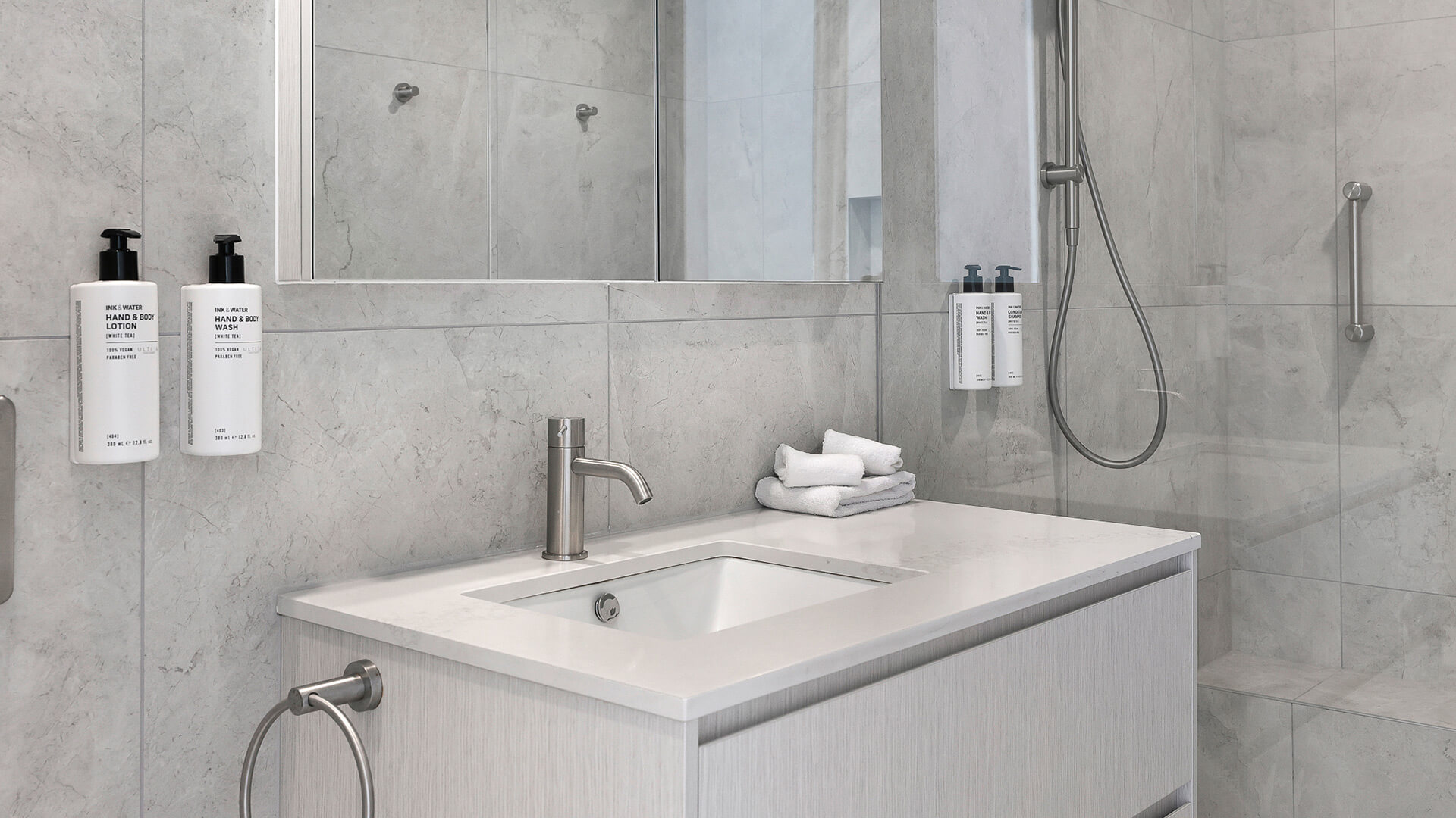 Ensuite bathroom with vanity and walk-in shower in 2 Bedroom Gold Coast View Suite at ULTIQA Air on Broadbeach.