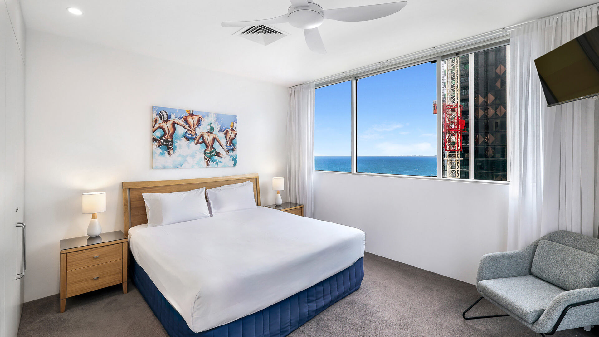 Bedroom with king bed and ocean views in 2 Bedroom Gold Coast View Suite at ULTIQA Air on Broadbeach.