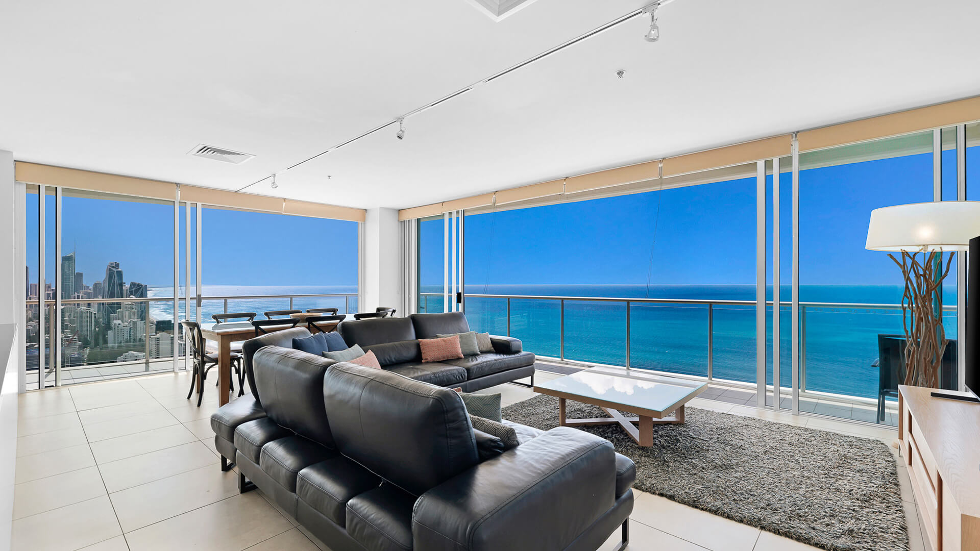 Living area with ocean views in 4 Bedroom Ocean View Apartment at ULTIQA Air on Broadbeach.