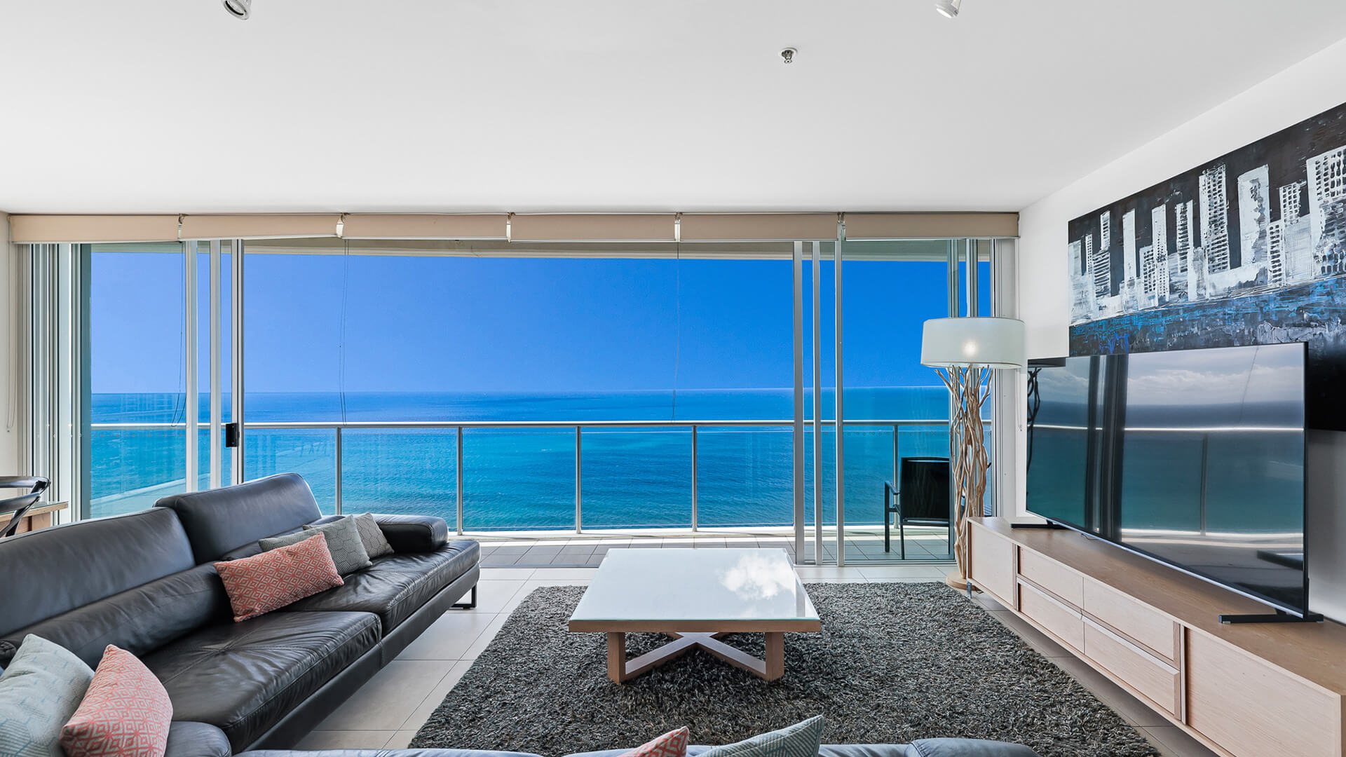 Living room with ocean views in 4 Bedroom Ocean View Apartment at ULTIQA Air on Broadbeach.