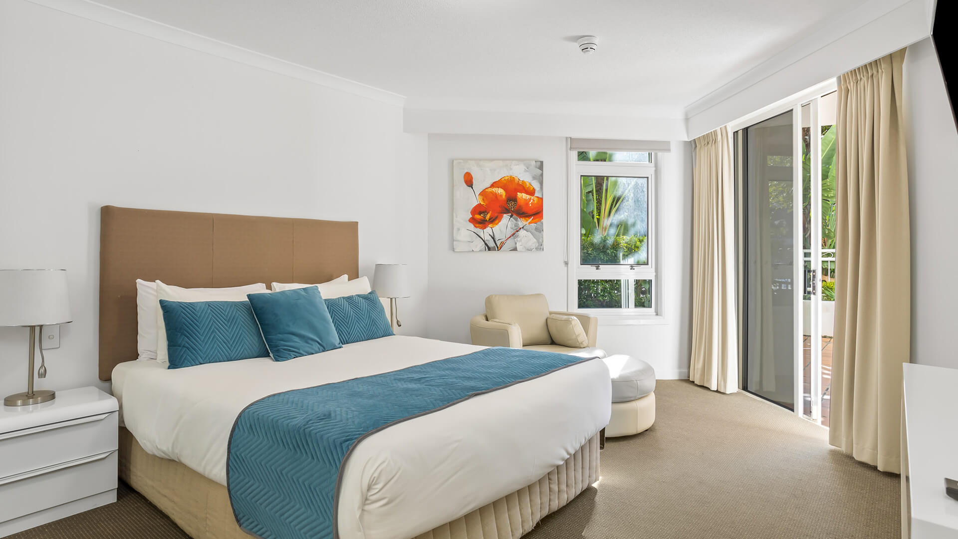 Master bedroom with garden views in 2 Bedroom Garden View Apartment at ULTIQA Burleigh Mediterranean Resort.