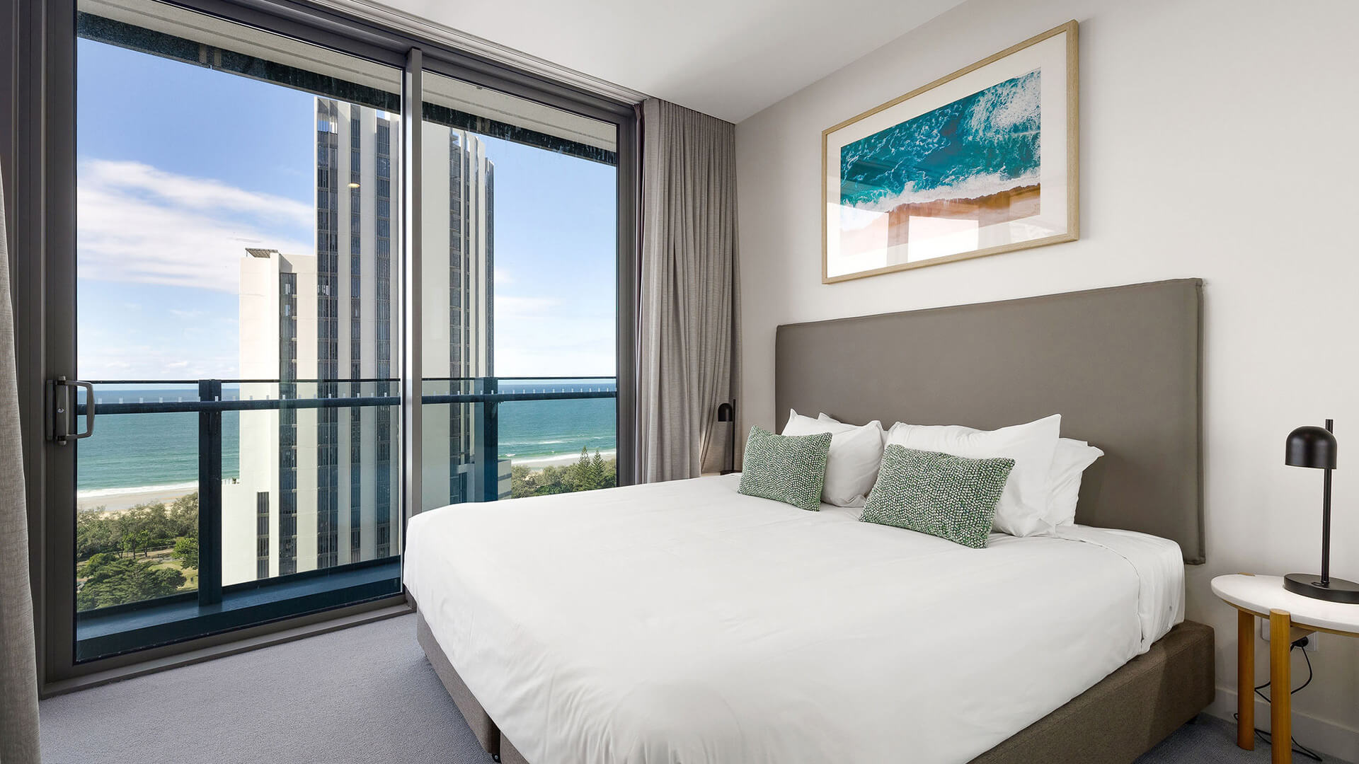 Bedroom with ocean views in 1 Bedroom Ocean View Suite at ULTIQA Signature at Broadbeach.