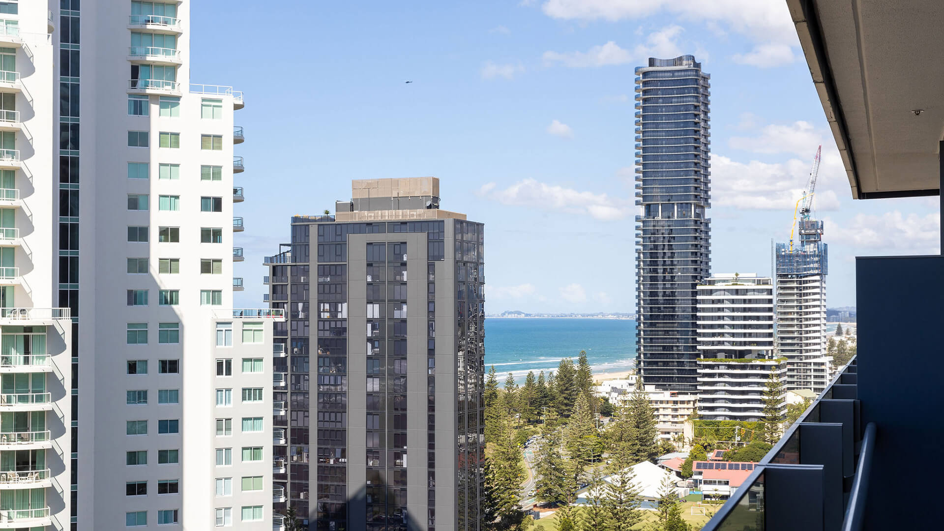 City and ocean views from the 1 Bedroom Ocean View Suite at ULTIQA Signature at Broadbeach.