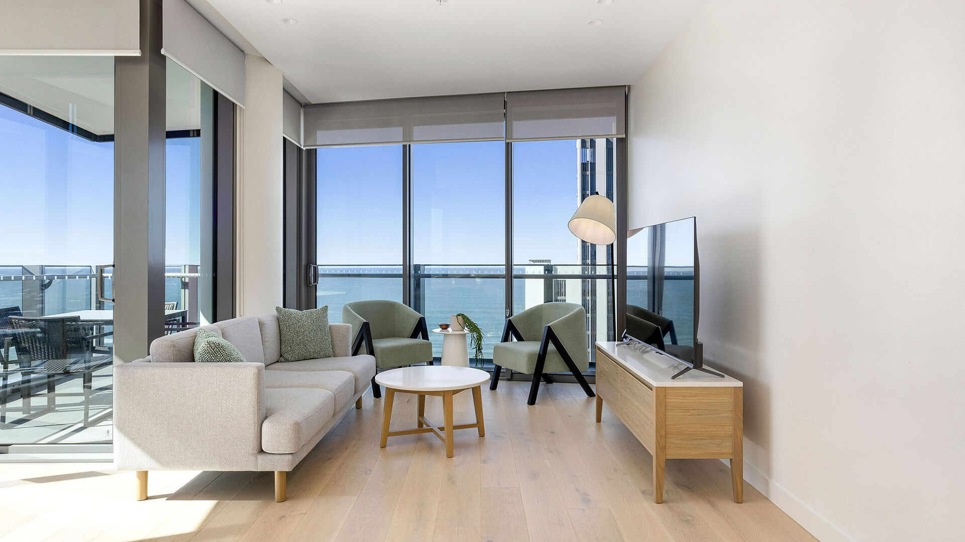 Ocean view living area in 2 Bedroom Ocean View Suite Premium at ULTIQA Signature at Broadbeach.